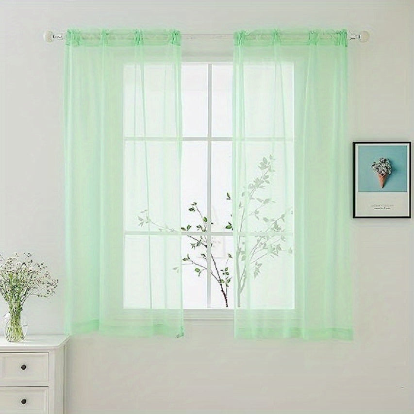 Two panels of sheer curtains with a basic rod pocket design, perfect for adding a touch of elegance to your bedroom, office, living room, yard, kitchen, or any other space in your home.