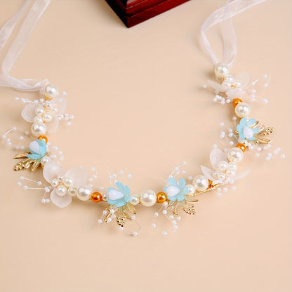 Elegant white plastic headband with floral design for girls, perfect for performances and vacations.