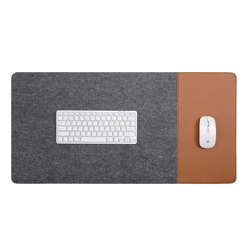 Large gaming mouse pad with anti-slip felt and faux leather, suitable for e-sports, writing, and office use. Includes wrist support and keyboard pad.