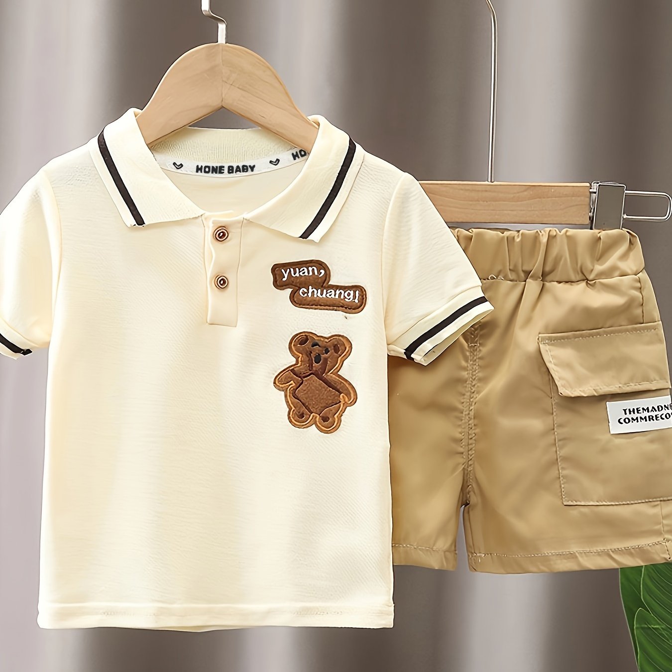 Infant boys' adorable bear embroidered summer outfit with short-sleeve golf shirt and pocketed shorts, perfect for outdoor activities.