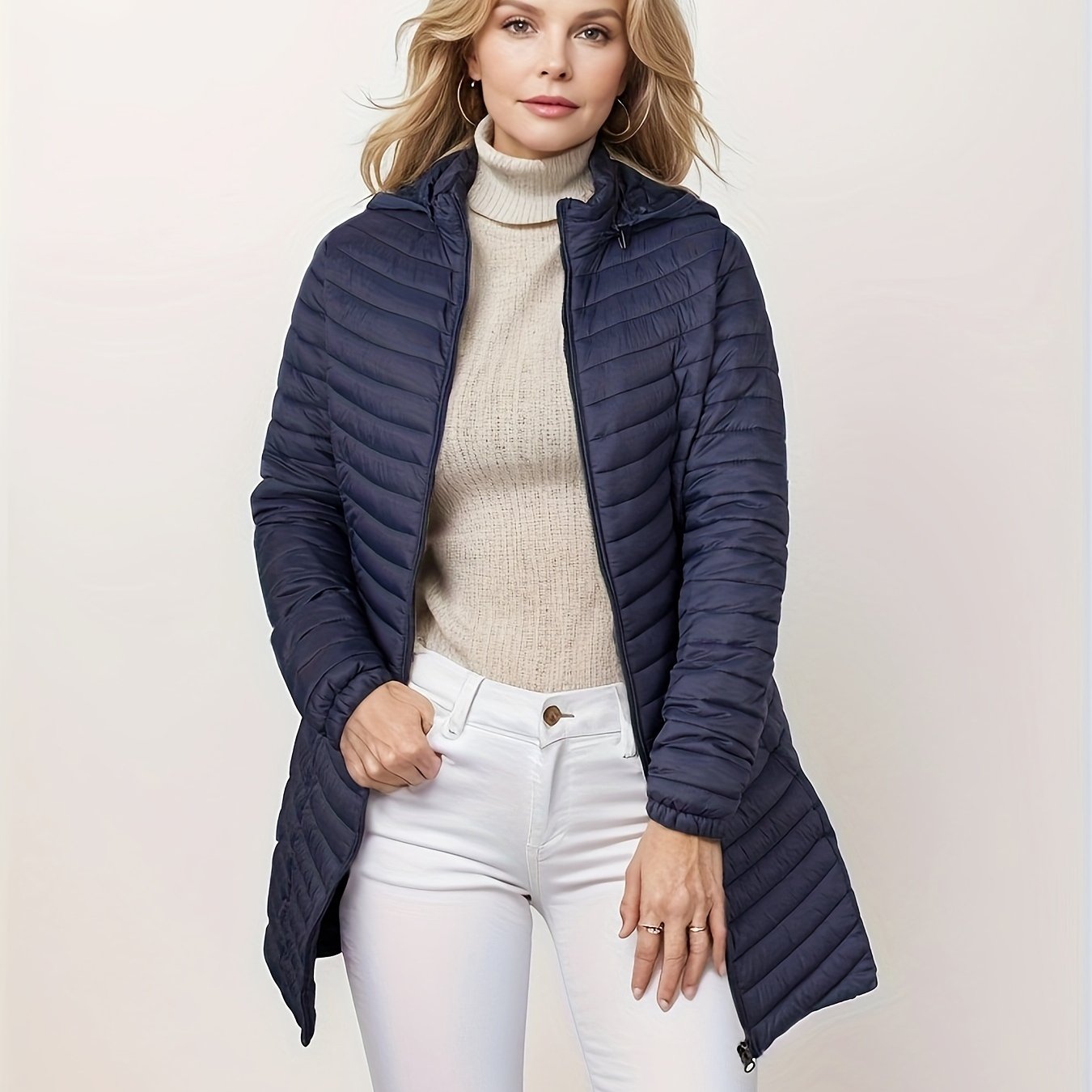 Women's lightweight puffer coat with detachable hood, perfect for winter comfort.