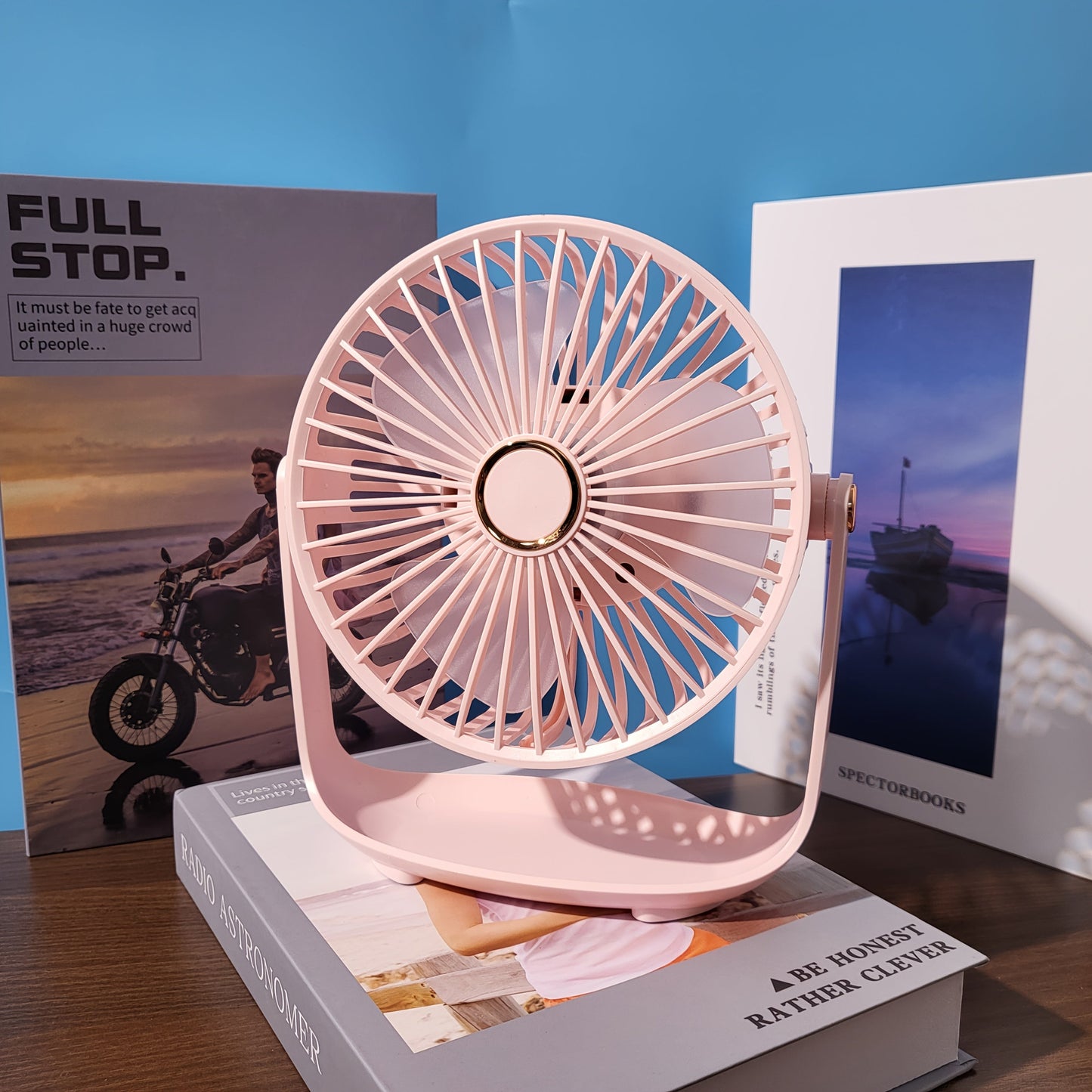 Experience the convenience of the JKUOO 19.99cm Portable Desk Fan with Nightlight. This fan features USB-C charging, 5-speed settings, 360° tilt, quiet operation, a 1200mAh lithium battery, and is made of high-quality plastic material. Perfect for both