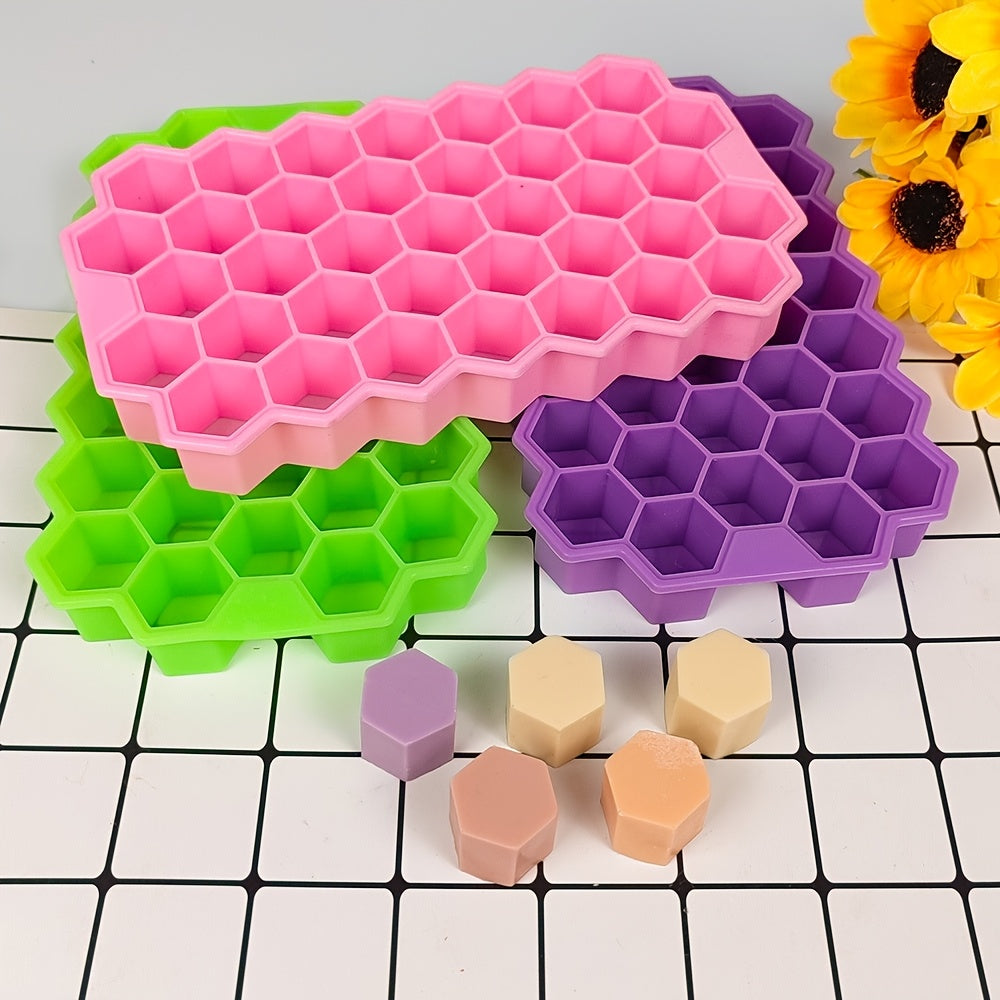 The Silicone Honeycomb Ice Tray is designed with 37 compartments and a lid for easy storage. Made of durable silicone, this tray is perfect for creating hexagonal ice cubes and can also be used for making chocolate, wax bottles, and candy. The flexible