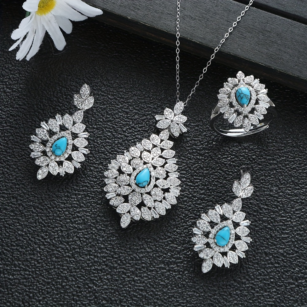 This Valentine's Day gift set includes a beautiful 925 silver chain with a vintage leaf design, a lovely water drop turquoise pendant, and a sturdy necklace, earrings, and ring set for women to wear during the holiday season.