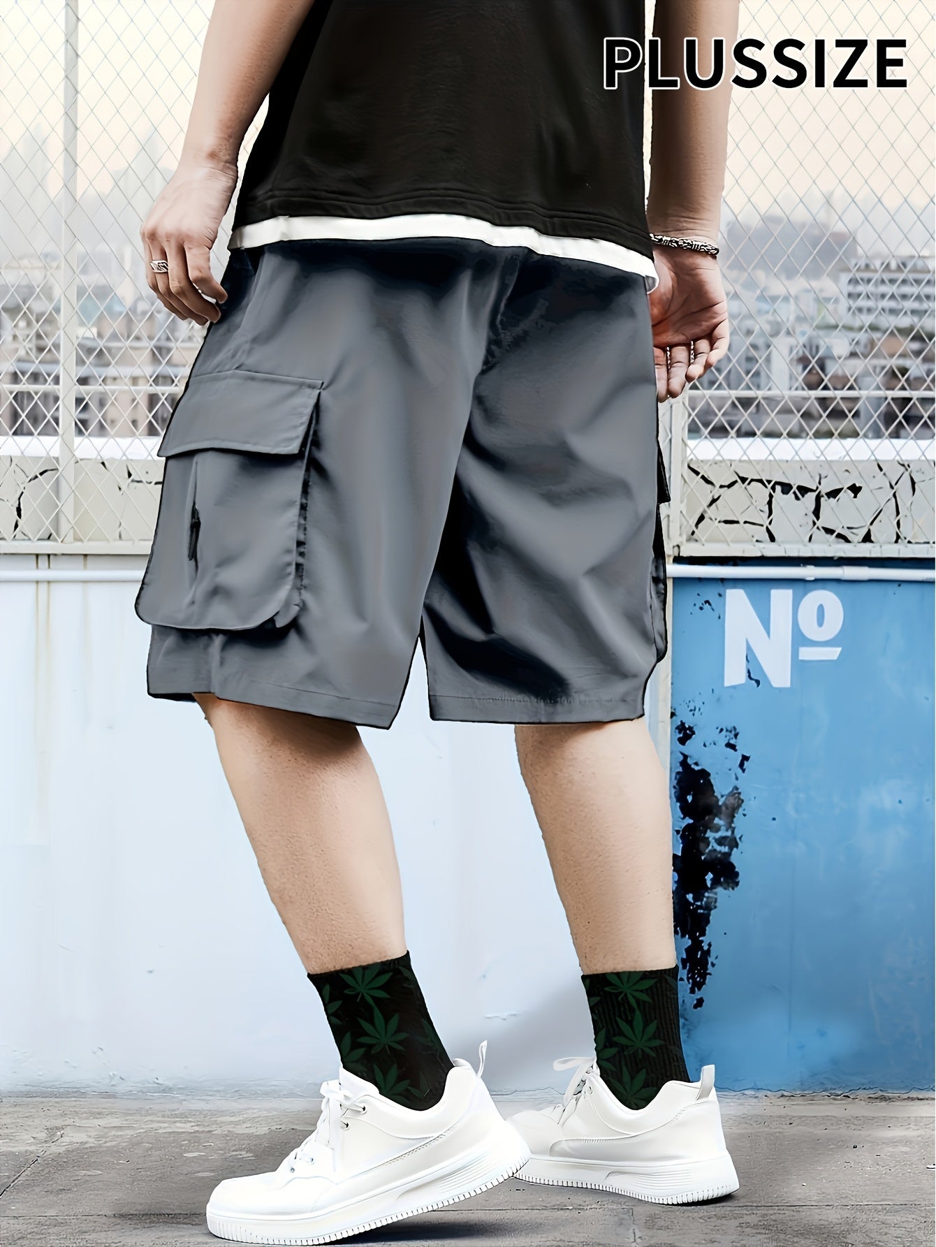 Versatile oversized cargo shorts for plus-size men, perfect for outdoor and street style wear.