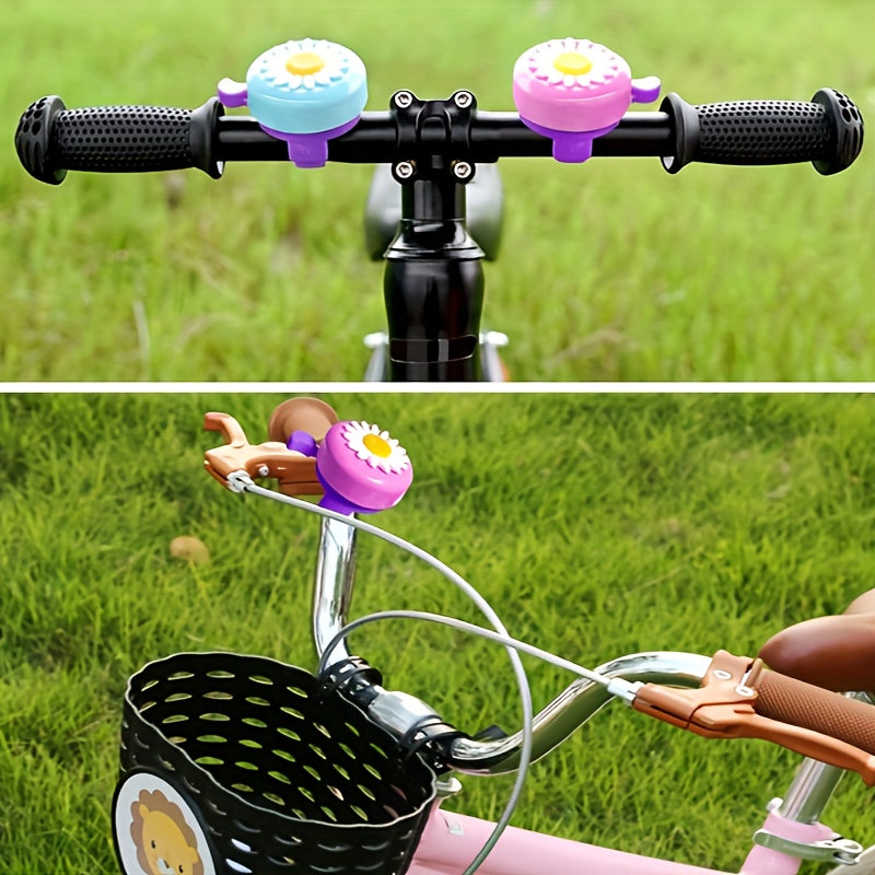 Colored bicycle bells featuring chrysanthemum and fun designs.