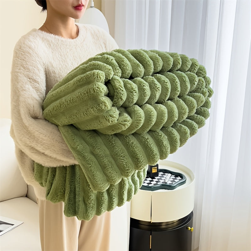 Indulge in the comfort of our luxurious plush blanket - a cozy fleece throw that will keep you warm and snuggled up on the sofa. This soft and insulating blanket is not only perfect for lounging, but also machine washable for easy care. Its modern style