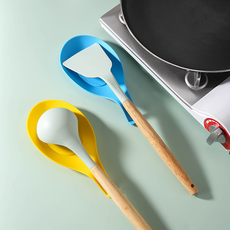 Silicone spoon rest for kitchen utensils - Easy to clean, heat-resistant holder for spoons and seasonings.