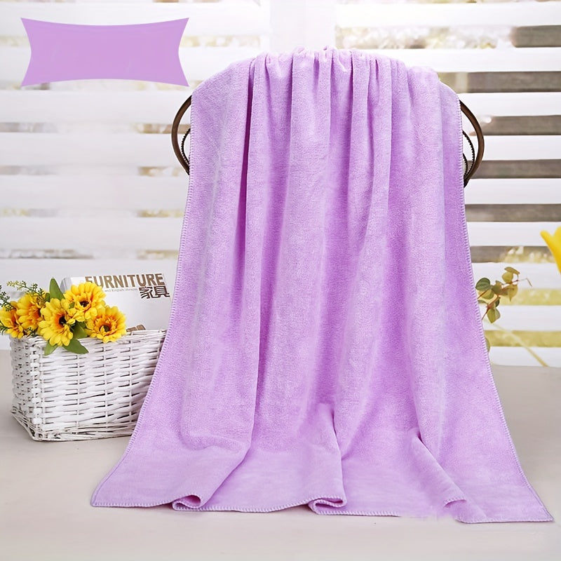 Soft microfiber bath towel with quick dry and absorbent features for use at home or in the spa, featuring a modern cloud pattern design.