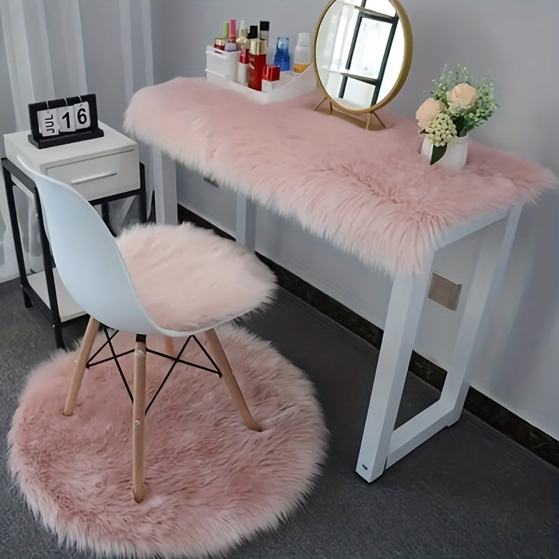 Soft and fluffy, this pink faux sheepskin fur area rug is perfect for adding a cozy touch to any room. Ideal for living rooms, dorms, bedrooms, nurseries, this shag rug is both stylish and practical. Easy to clean and great for placing under a dresser or