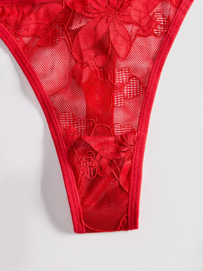 Stylish red lace thong with straps for women.