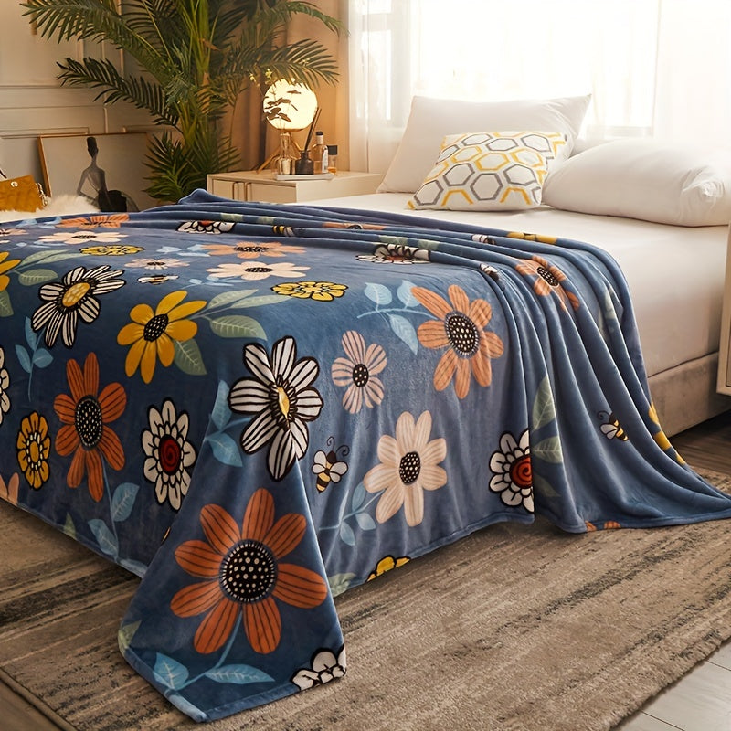 The Flower Print Flannel Blanket is the perfect addition to your home decor. This soft and warm throw blanket is ideal for snuggling up on the couch, sofa, or bed. It is also great for taking with you on camping trips or travels. This multi-purpose