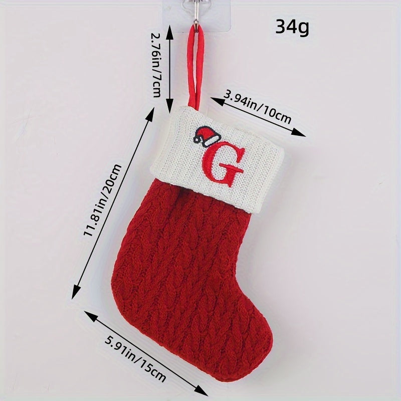 Knitted letter Christmas socks for home tree ornaments; red socks in gift bag for festive attire.