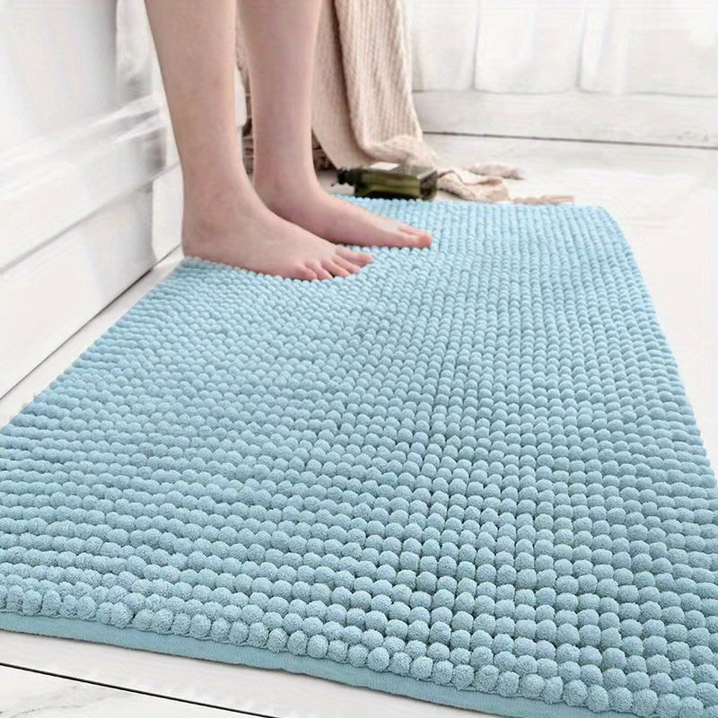 Get this luxurious Chenille Bath Mat, 2cm Thick, with a non-slip, super absorbent, quick-dry design. Made of woven polyester with rubber backing, this mat weighs 1450gsm and is perfect for the bathroom, kitchen, bedroom, or entryway. It also makes a