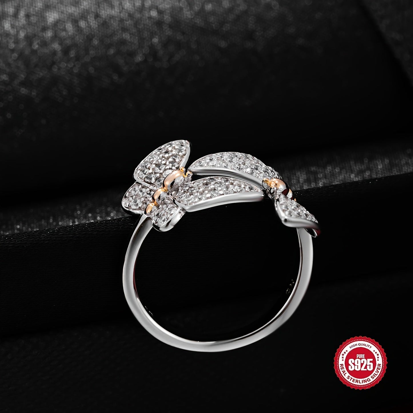 This elegant S925 silver double butterfly ring set with full zirconia is both stylish and delicate. It features an adjustable opening, making it a perfect gift for your girlfriend on Valentine's Day. It is also suitable for wearing with banquet outfits.