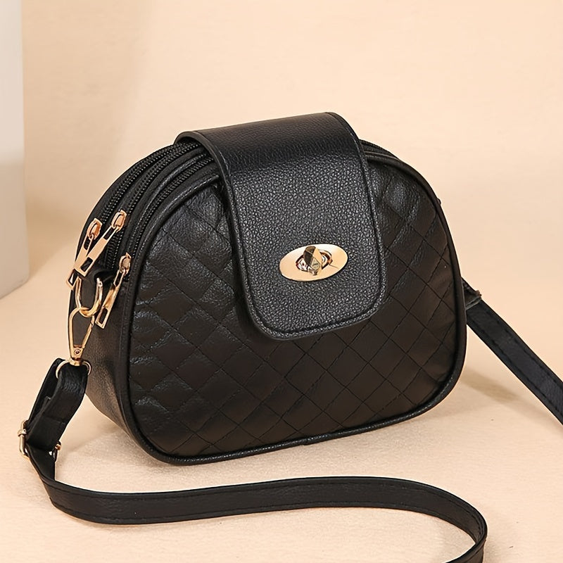 Women's black quilted crossbody bag with adjustable strap, zipper closure, tassel embellishment, and polyester lining.