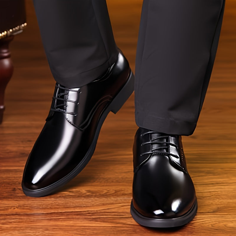 Black faux leather dress shoes with pointed toe and lace-up design, ideal for business, weddings, and parties.