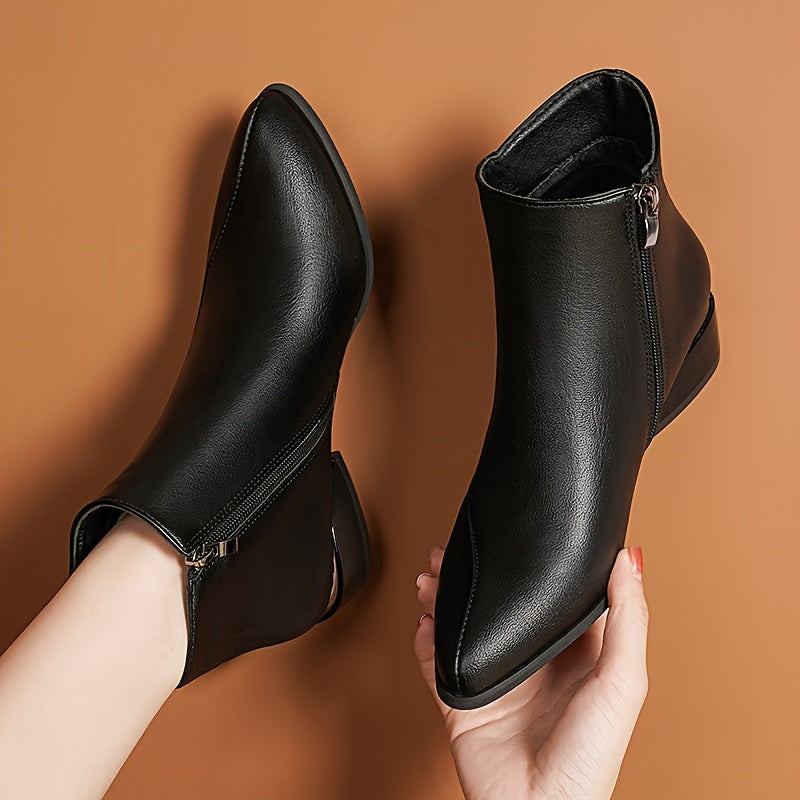 Women's low heeled ankle boots with pointed toe and side zipper, perfect for casual wear.