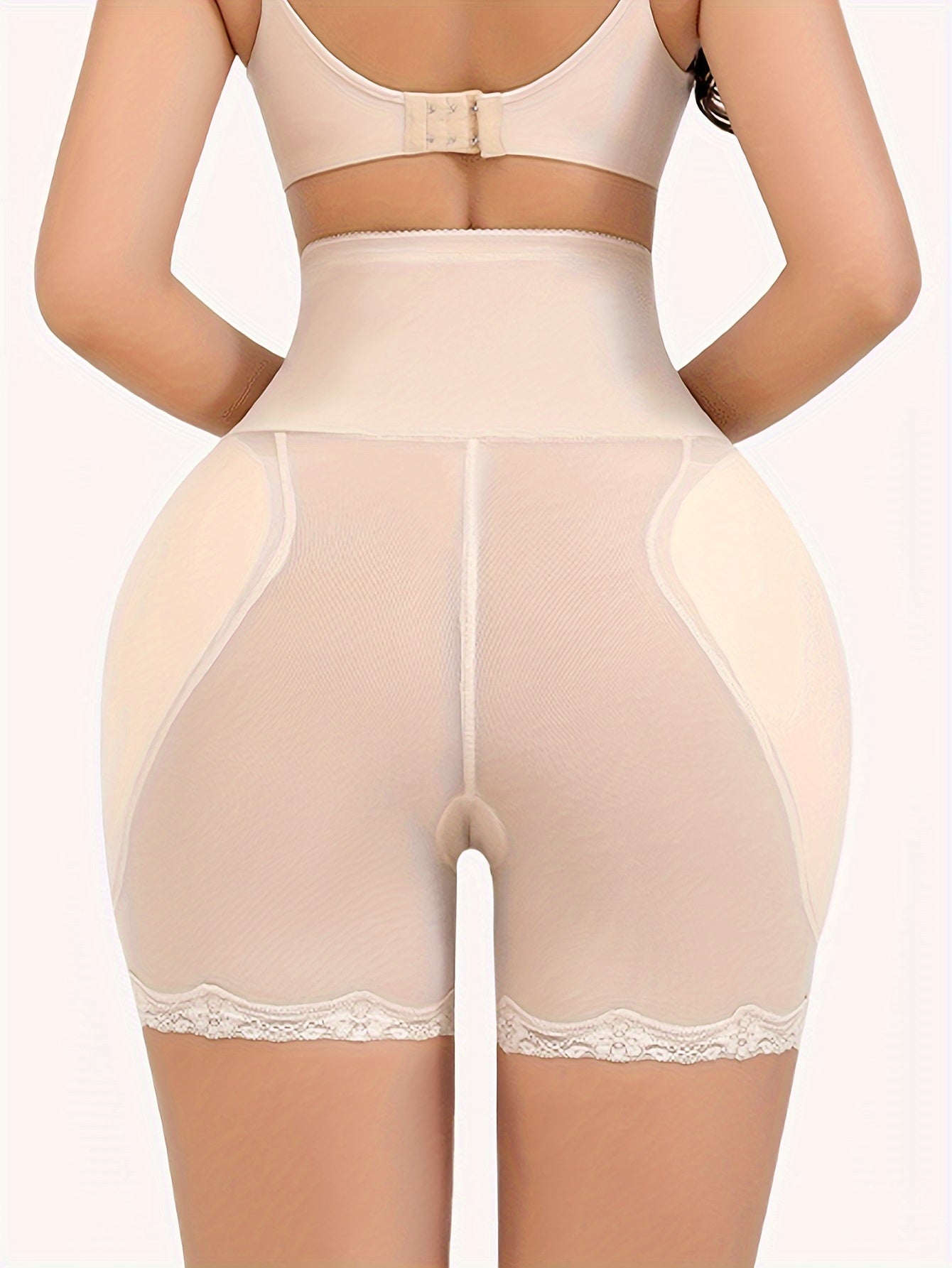 Lace trim shaping shorts for women with tummy control and butt lifting features.