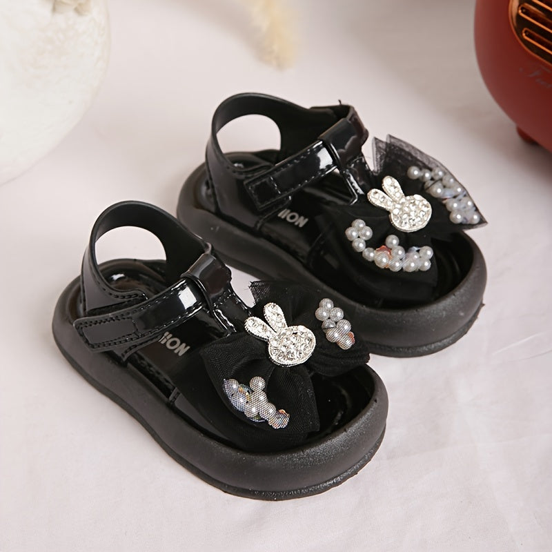 New 2024 baby girl sandals with anti-kick feature, cute rabbit design, and soft soles for beach.