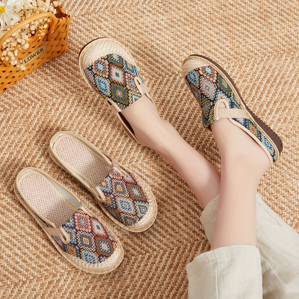 Breathable and lightweight linen slippers for women in a colorful geometric print. Features soft sole, round toe, and hand washable design for all-season comfort. Available in blue, pink