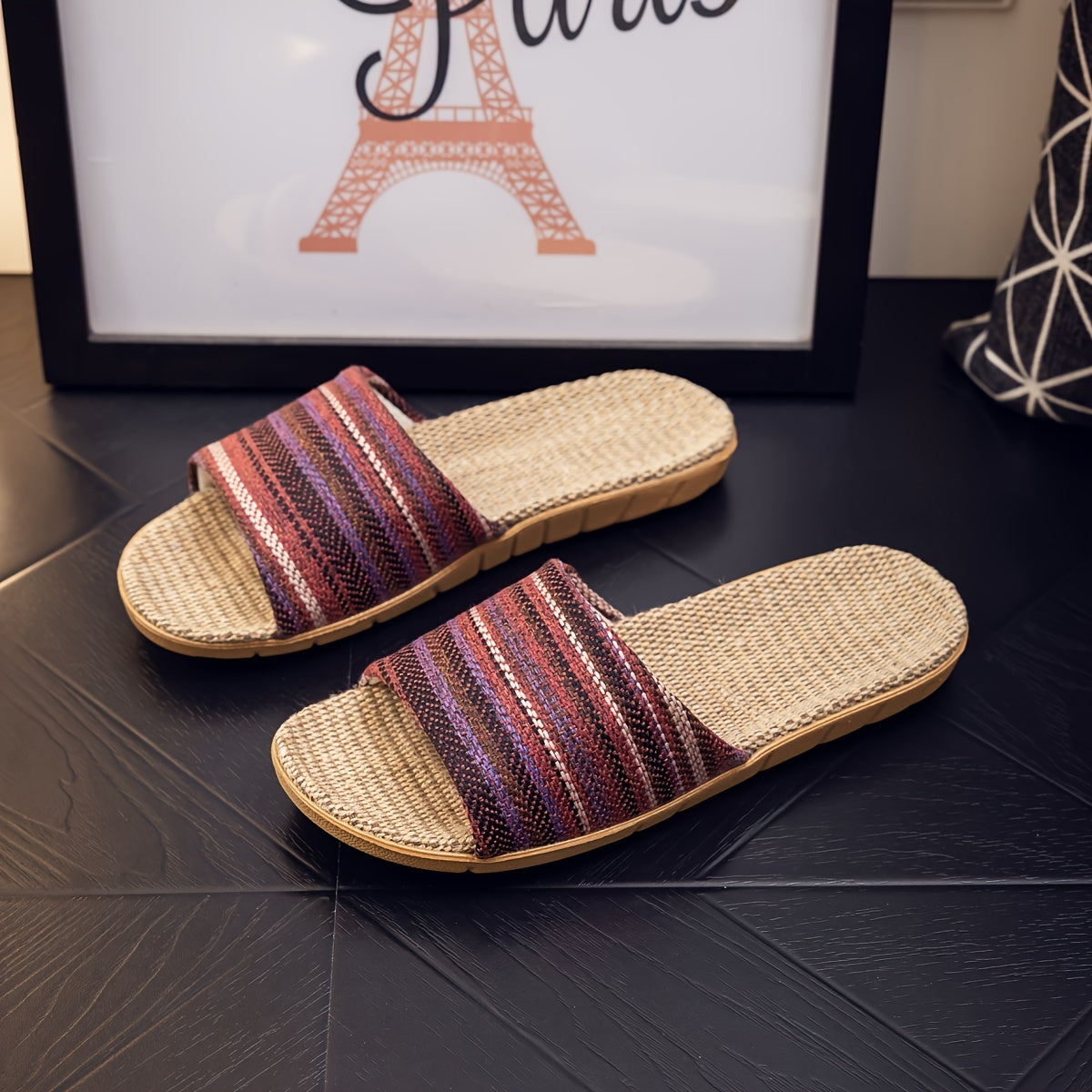 Comfortable home slippers with a striped pattern and casual open toe design.