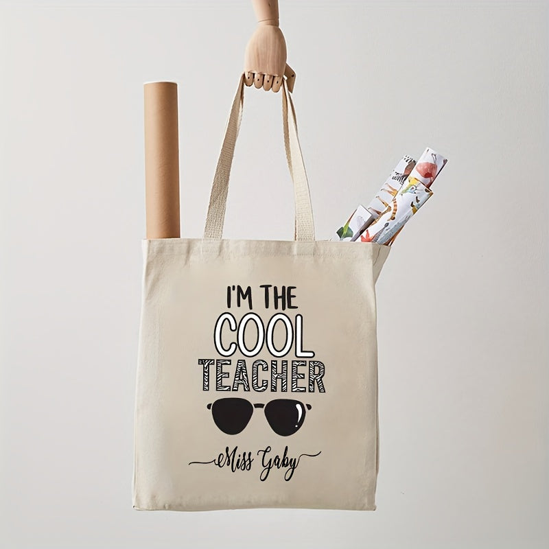 Customized Teacher Shoulder Bag with "I'm The Cool Teacher" Pattern, featuring a personalized name. This stylish canvas shopping bag is perfect for female teachers and makes a great gift for any teacher who loves aesthetic school bags.