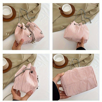 Fashionable women's bucket bag with drawstring closure, available in various colors.