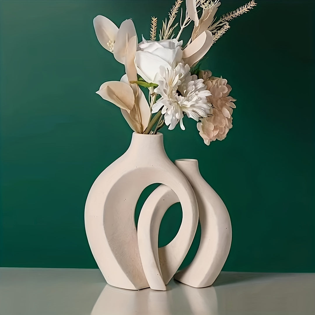 Set of 2 white ceramic vases in Nordic Boho style for elegant home decor, suitable for various rooms and occasions.