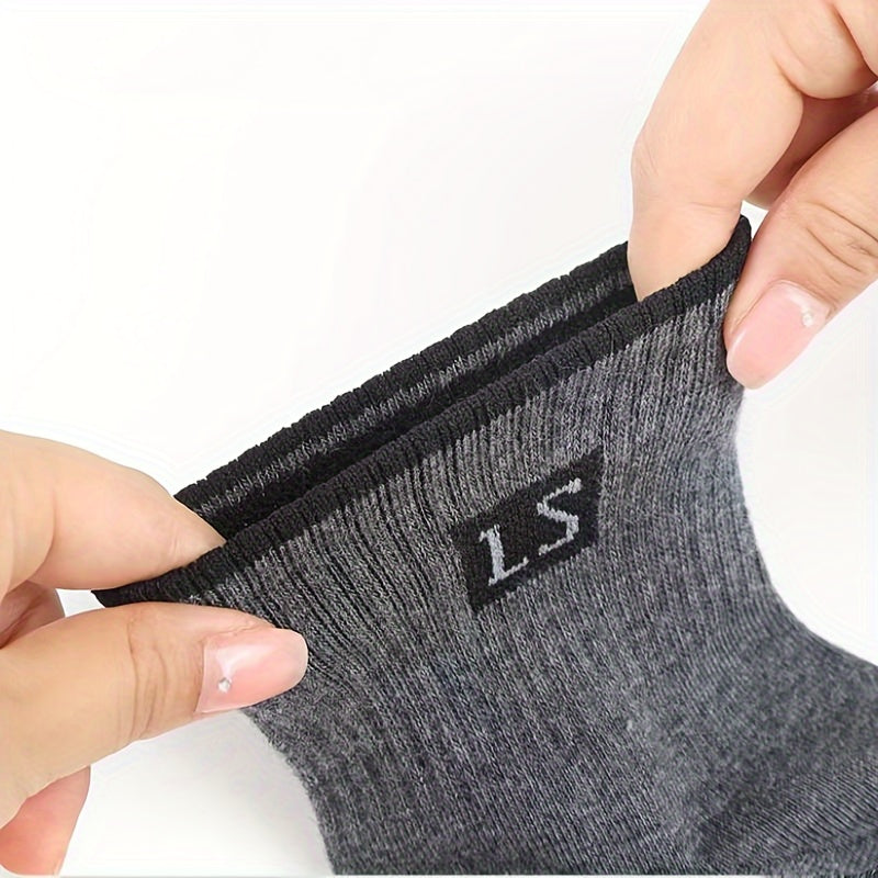 5 pairs of men's crew socks with alphabet pattern, made of knit polyester and spandex blend, breathable and soft, suitable for sports and casual wear, machine washable.