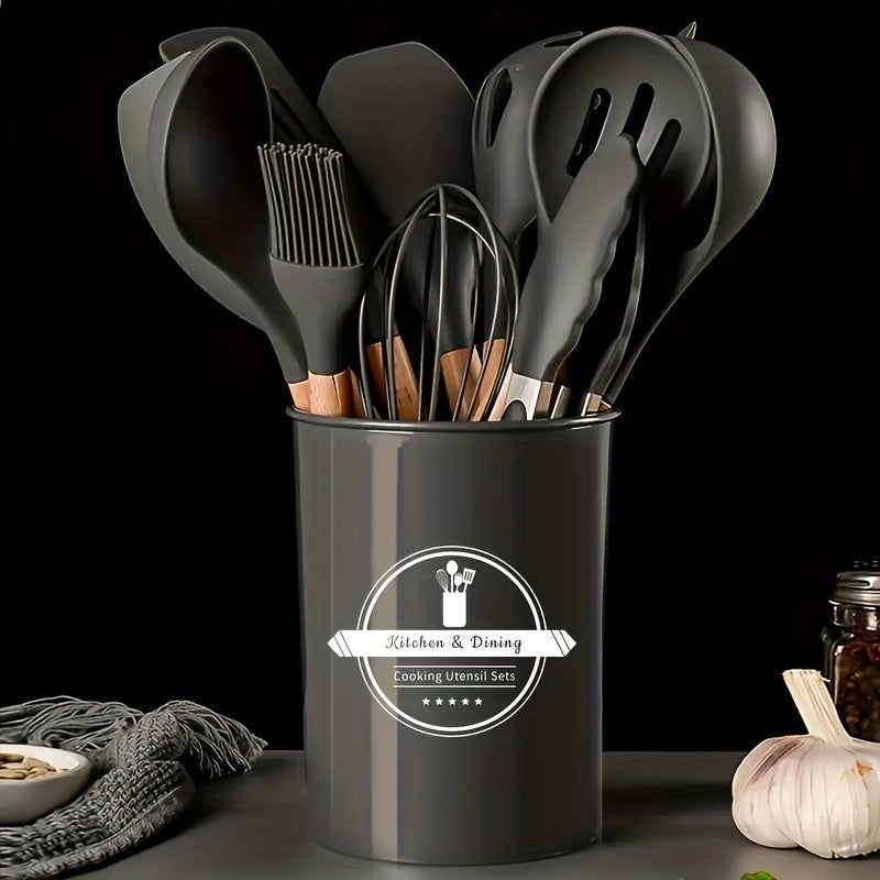 [Highly Rated] This 12-piece kitchen utensil set features silicone and wooden handle cookware that is perfect for all your cooking needs. These heat-resistant utensils are gentle on pots and pans and come with a convenient storage bucket for added