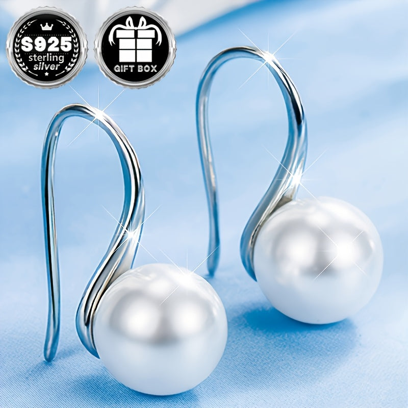 Classy and chic earrings designed for women, showcasing a timeless and minimalist style accented with lovely pearl details. Crafted from 1.55g of high-quality 925 silver, these earrings are perfect for everyday wear, work, special events, and make a