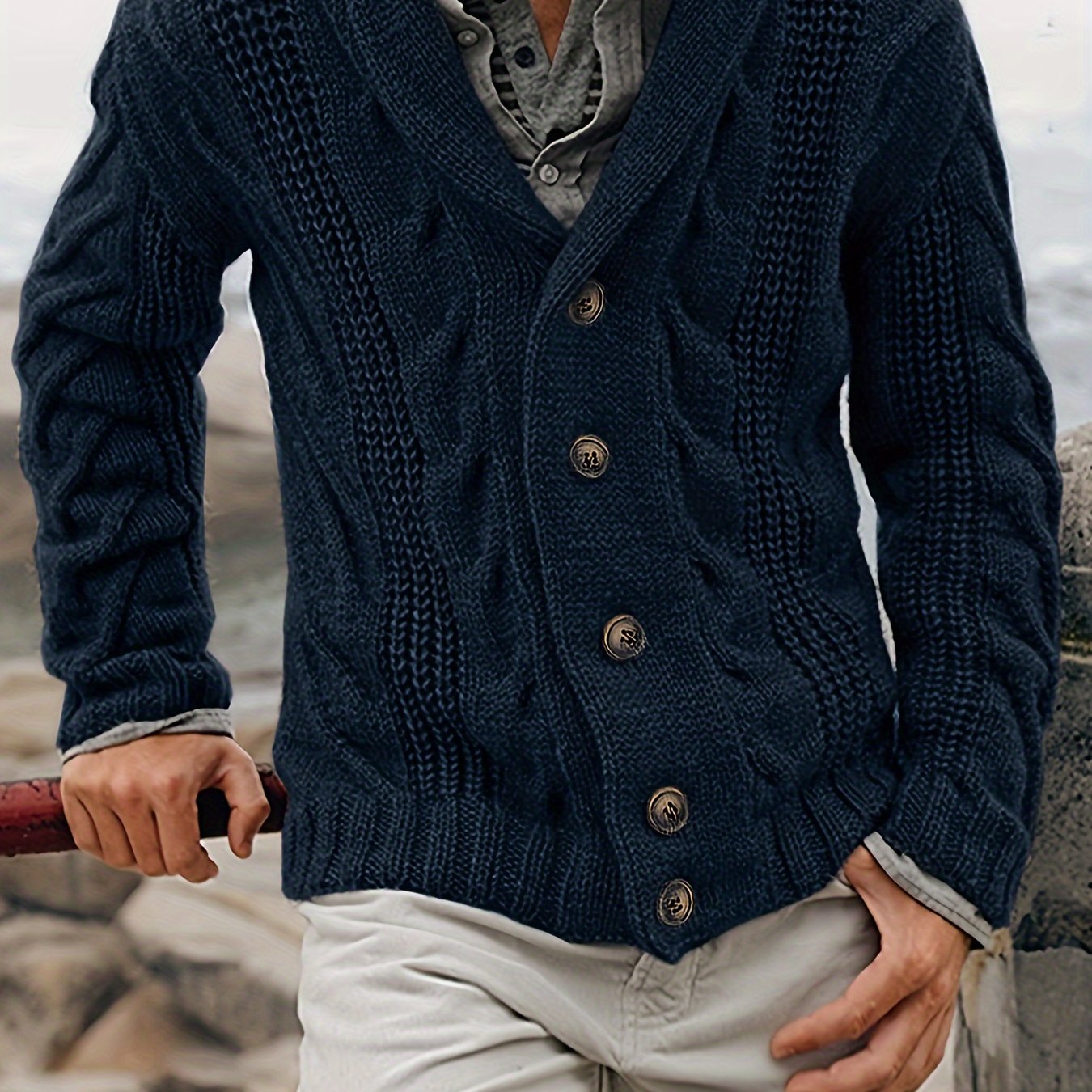 Men's casual knit polyester cardigan sweater in solid color with long sleeves, drop shoulder, lapel collar, button details; ideal for fall/winter layering. Features a classic, relaxed fit