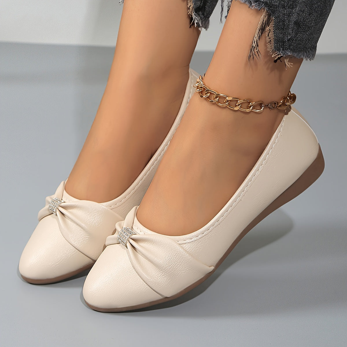 Women's flat shoes with bowknot and rhinestone decoration, pointed toe, soft sole, slip on style.