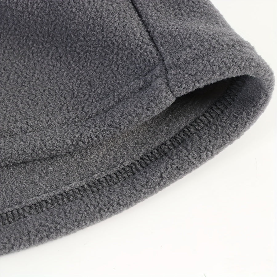 Stay warm and protected this winter with our Winter Fleece Balaclava Hat. This versatile 4-in-1 accessory includes an integrated face mask, earmuffs, and scarf, making it the perfect solution for all your outdoor activities. The adjustable design ensures