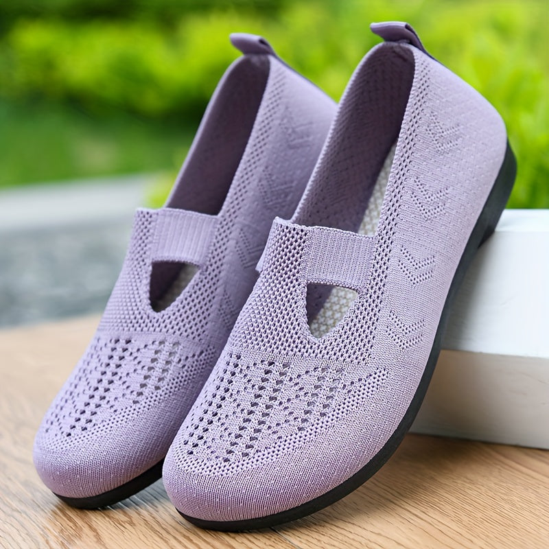 Breathable slip-on sneakers for women with soft sole and non-slip knit upper, ideal for casual wear.