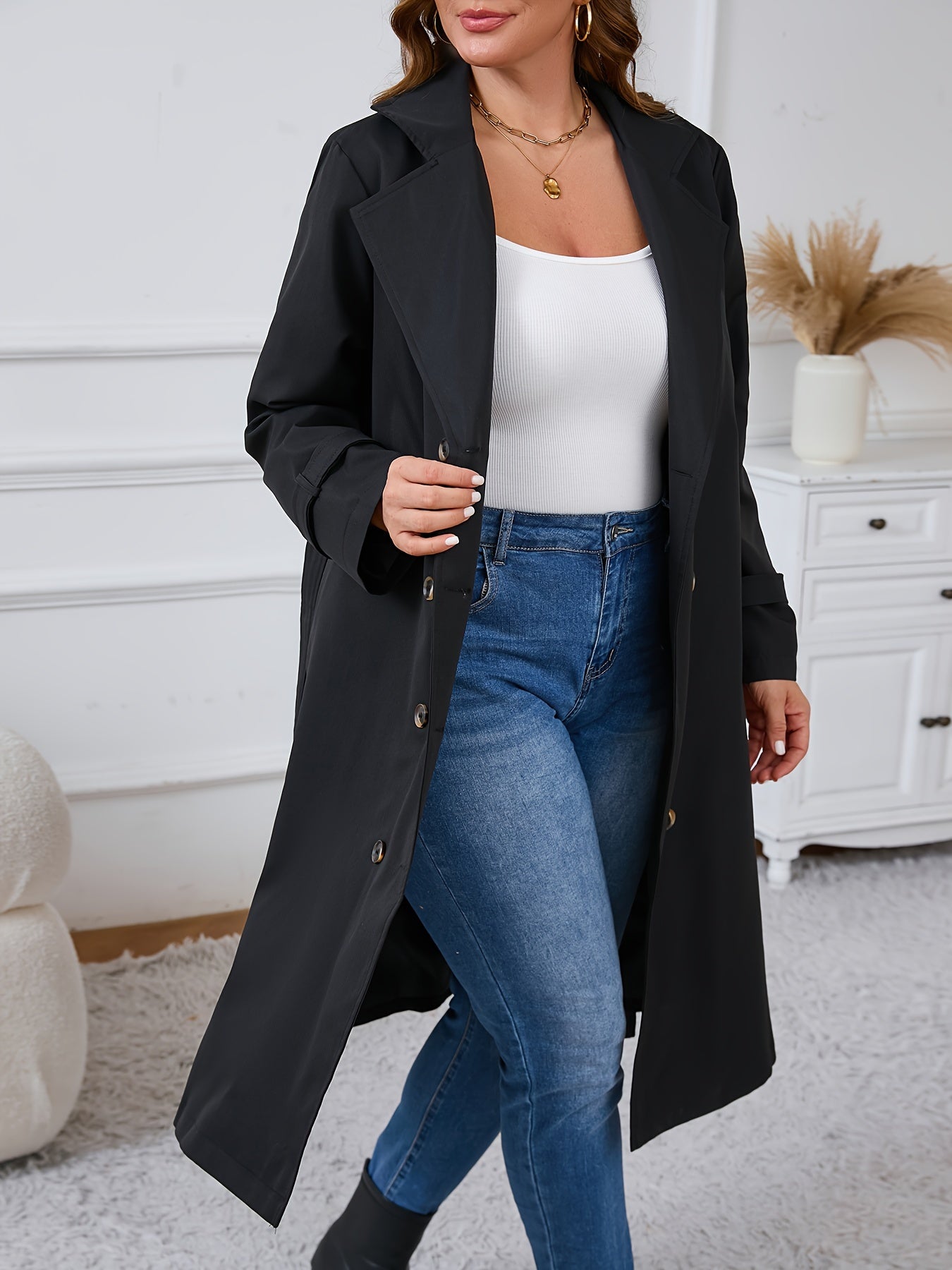 Plus size trench coat in casual style, made of 100% polyester with a double-breasted design. Features long sleeves, solid color, and lapel collar. Regular fit, non-stretch woven fabric