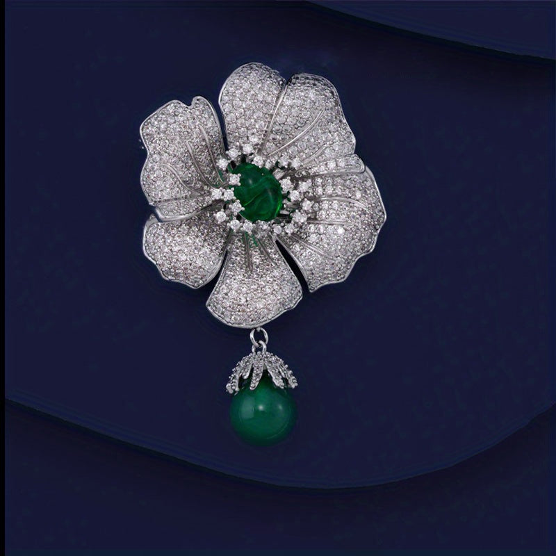 A stunning Camellia brooch featuring vibrant green cubic zirconia stones, exuding a luxurious and elegant style. An ideal Christmas gift, exuding a captivating atmosphere with its full drill design. Perfect for adding a touch of glamour to holiday