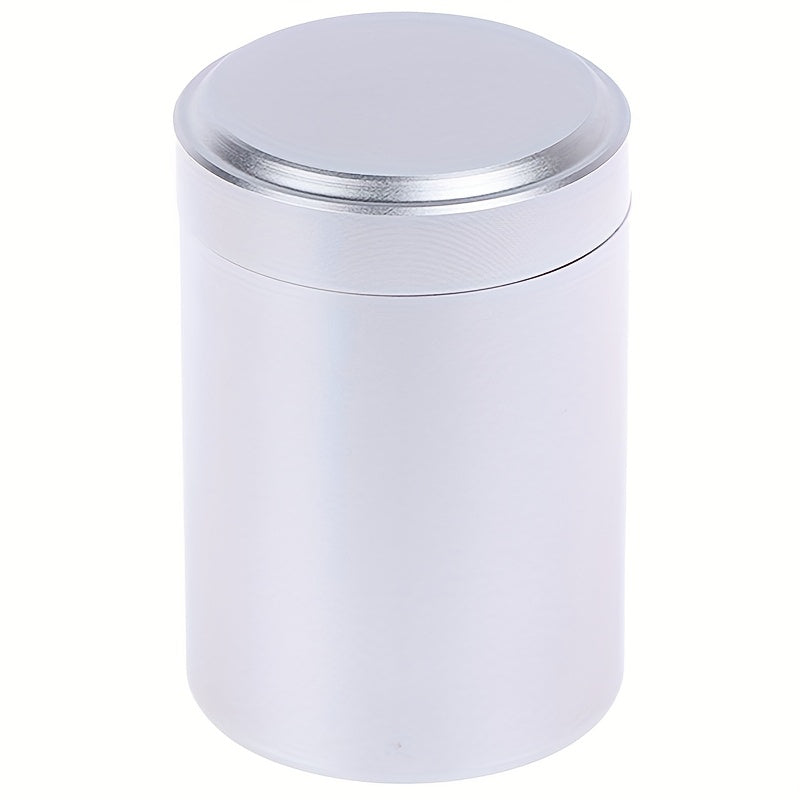 Compact and innovative, this tea packaging box is a portable canister crafted from titanium-aluminum alloy for durable and secure storage of tea leaves.