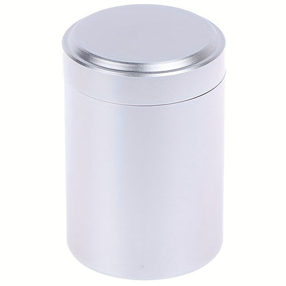 Compact and innovative, this tea packaging box is a portable canister crafted from titanium-aluminum alloy for durable and secure storage of tea leaves.