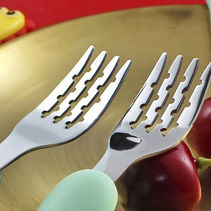 Children's cartoon dinosaur fork and spoon set made of portable 304 stainless steel for learning and training purposes.