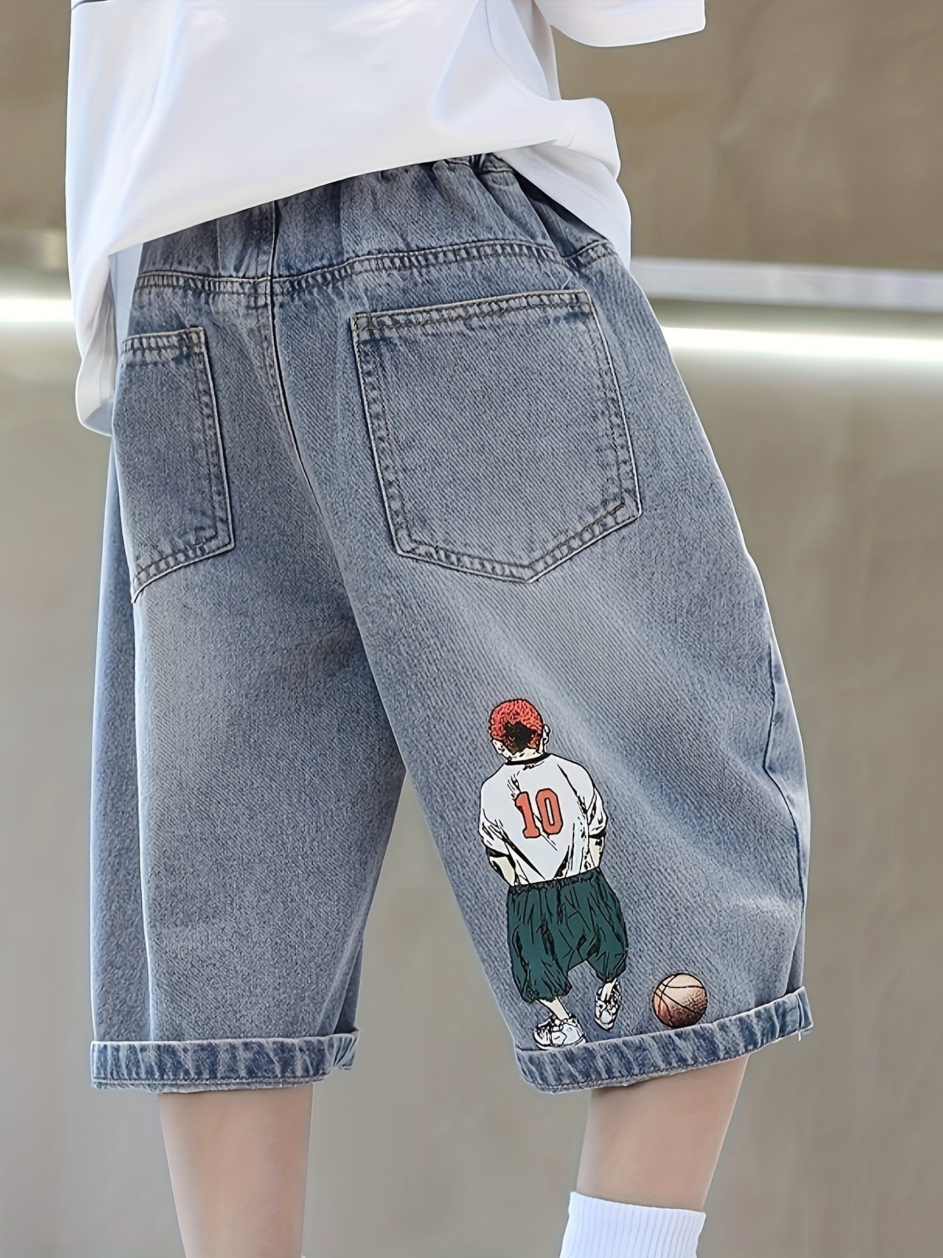 Boy's wide leg cropped jeans with cartoon graphics, loose and comfy for all seasons.