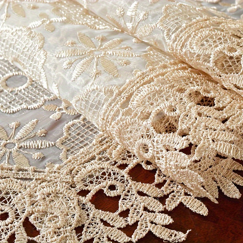 Polyester table runner with white embroidery flowers and lace edge, perfect for room or dining table decor.