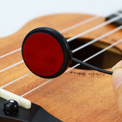 Professional-grade piezoelectric contact pickup for acoustic guitars, ukuleles, karimbas, harps, and banjos - simple installation.