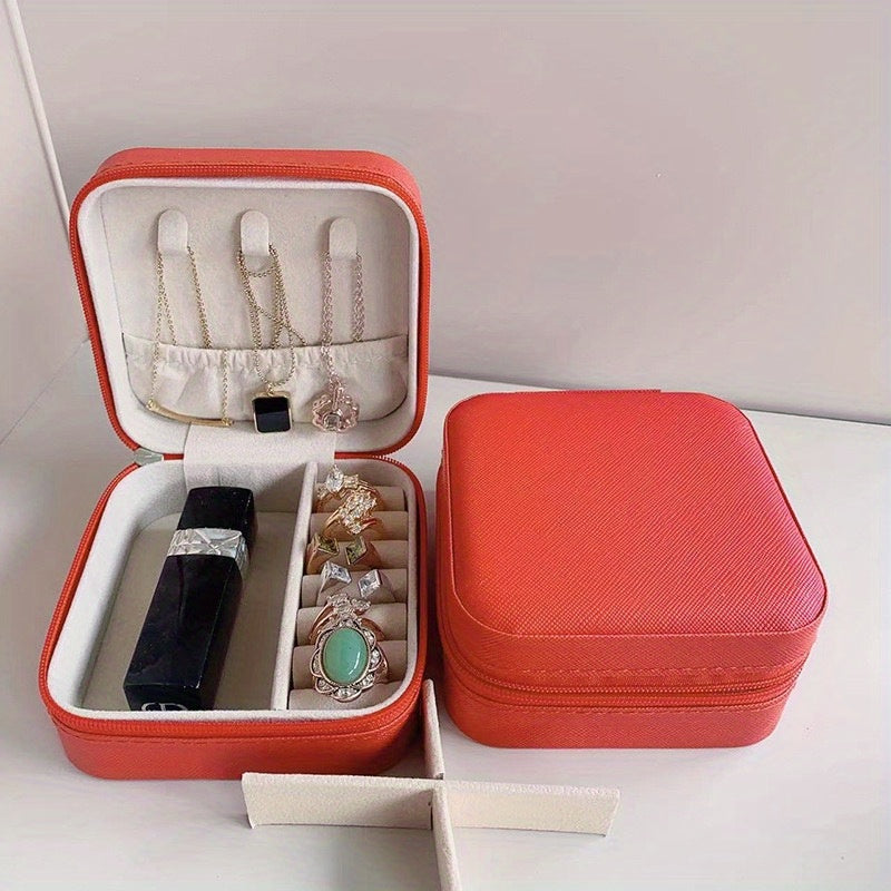 One stylish and portable jewelry box for earrings, rings, and necklaces.