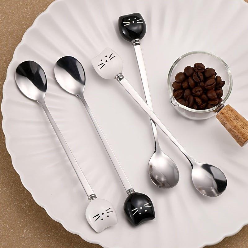 Charming stainless steel coffee stirrers with whimsical ceramic kitty spoons.