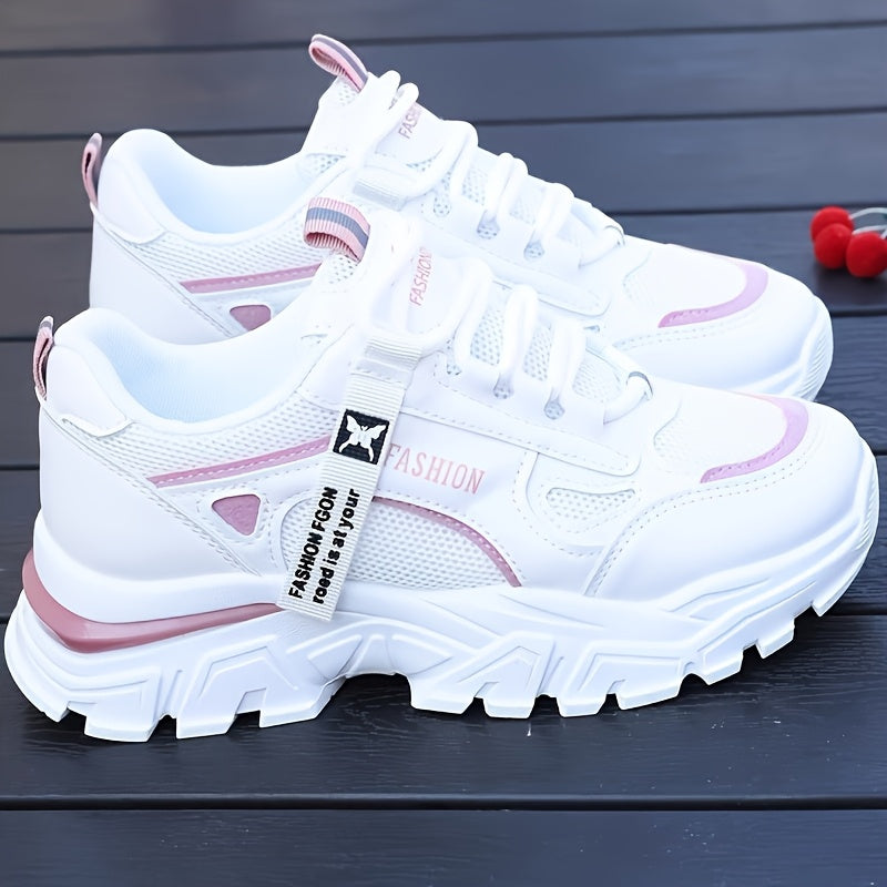 Women's white sneakers with low top lace-up, mesh upper, breathable fabric insole, and durable PVC sole for casual and sporty wear. Casual and trendy footwear.