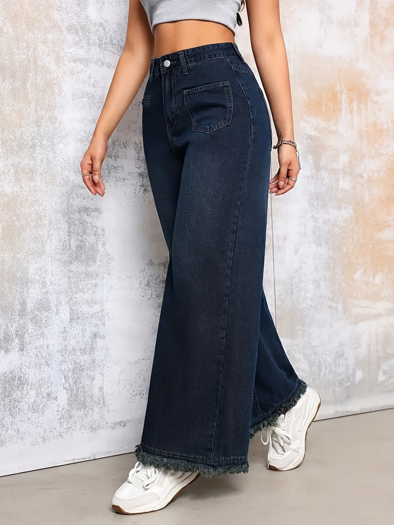 Stylish high-waist flare jeans for women in stretch denim with raw hem, machine washable - ideal for year-round wear.