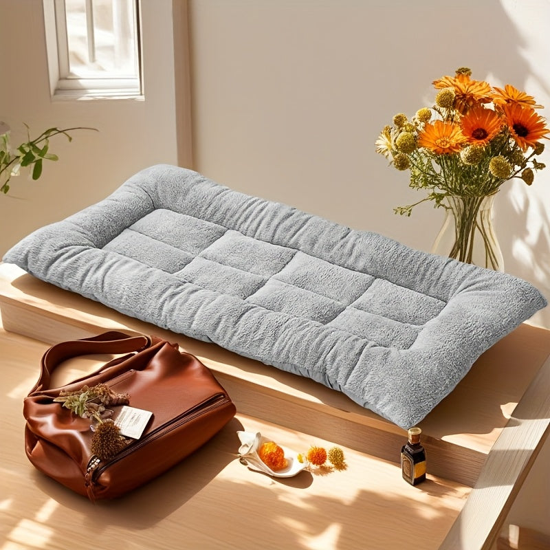 Large plush dog bed with soft, thick polyester fiber, in light gray and white, for small to large breeds, providing quilted comfort on a cozy rectangular couch.