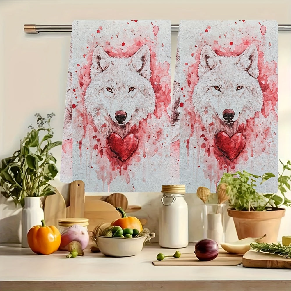 Set of 2 Ultra Soft Kitchen Towels featuring a Valentine's Day Wolfy design. These highly absorbent and machine washable dish hand towels measure 40.64x60.96 cm. The contemporary white towels are accented with red splashes and a heart detail, perfect for